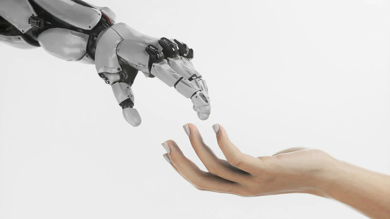 Robotic arm reaching toward an open human hand against a clean white background, nearly touching fingertips